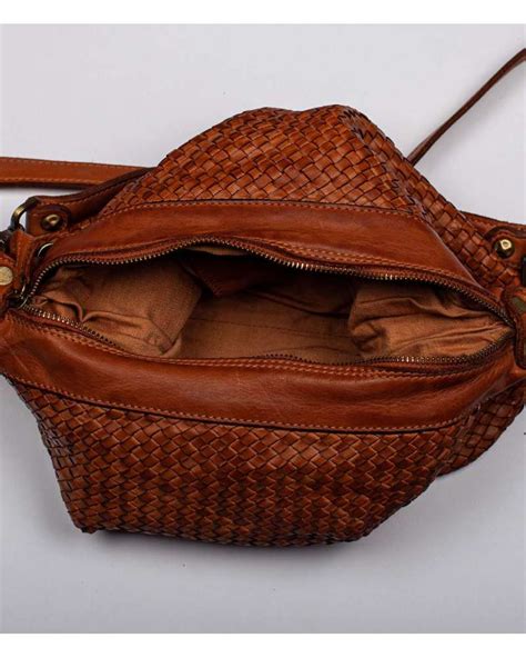 borsa cuoio con fiocco|Borse in pelle intrecciata .